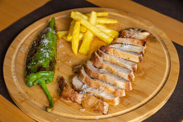 Secreto iberico with Italian bell pepper and potatoes