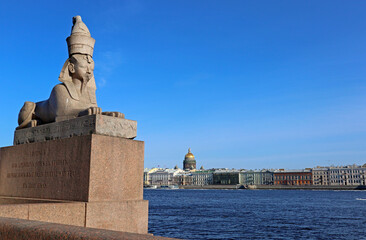 Spring landscape with an ancient Egyptian sphinx in St. Petersburg, Russia. Ancient sculpture is...