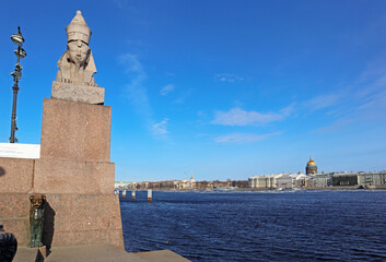 Spring landscape with an ancient Egyptian sphinx in St. Petersburg, Russia. Ancient sculpture is located on the Neva river embankment.