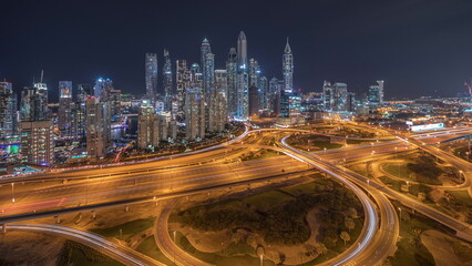 Fototapeta na wymiar Dubai Marina highway intersection spaghetti junction night timelapse