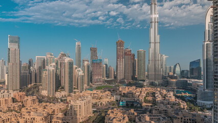 Fototapeta na wymiar Dubai Downtown morning timelapse with tallest skyscraper and other towers