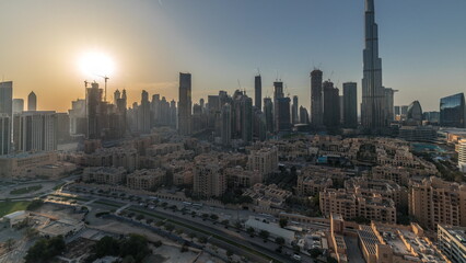Dubai Downtown all day timelapse with tallest skyscraper and other towers
