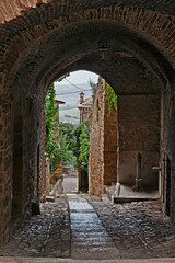 Fototapeta na wymiar Gualdo Cattaneo, Perugia, Umbria, Italy: ancient alley in the old town