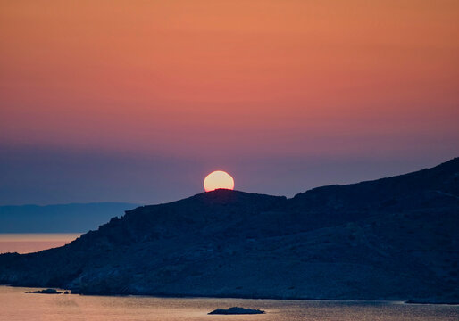 Greek Sunset in July. Copy Space

Greek Sunset in July. Copy Space
 Twilight in the Evening with an Orange Sky. Stock Image
