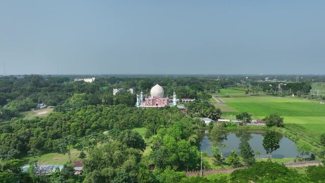 A beautiful shrine located in a rural area in Bangladesh. It is a place of peace and tranquility, where people come to pray, meditate, and reflect on life.