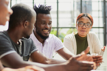 african business people handshake at modern office