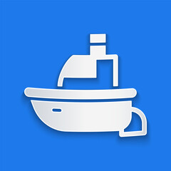 Paper cut Toy boat icon isolated on blue background. Paper art style. Vector