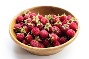 Fresh raspberry on white background.