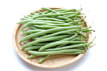 Fresh needle beans on white background