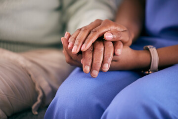 Nurse, holding hands and elderly support in a retirement and nursing home with care. Healthcare,...
