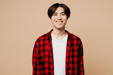 Young fun cool smiling handsome student attractive man of Asian ethnicity wear red checkered shirt...
