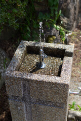 a waterfountain with water spraying