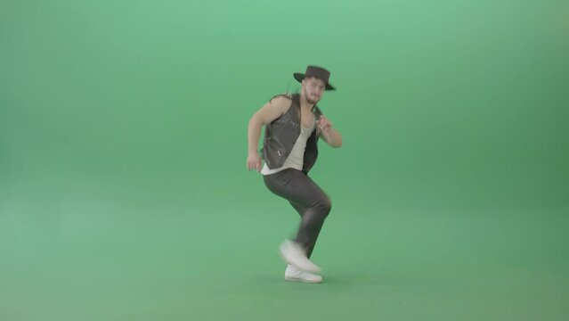 American Man with beard and in black hat dancing Shuffle isolated on Chroma key green screen