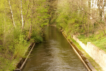 636941831 Kanal linksbiegung Flussbiegung im Abendlicht