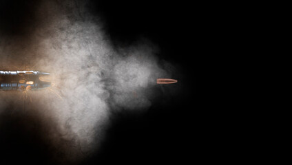 Copy space with bullet flyinjg out of an assault rifle