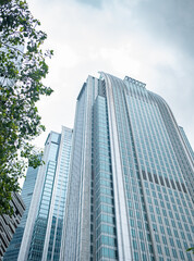 Obraz premium commercial buildings in a cloudy day vertical composition