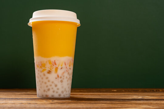 cup of mango pomelo sago dessert horizontal composition