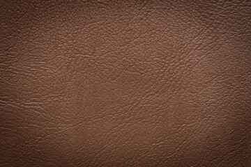 Brown leather texture closeup, useful as background