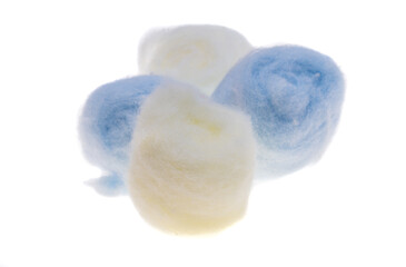 colored cotton balls isolated