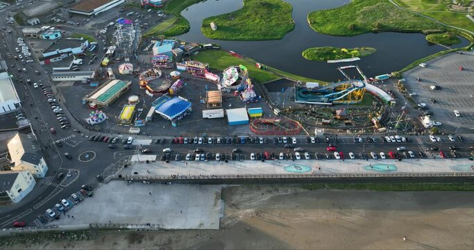 View of the amusement park located near the beach 4k