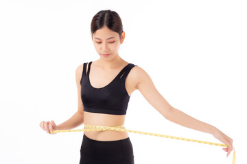 Portrait beautiful young asian woman measure tape with waist for weightloss with satisfied isolated...