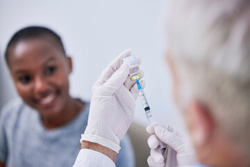 Bottle, needle and hands of doctor with patient for safety, healthcare and pharmaceutical medicine....