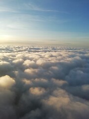 Fototapeta na wymiar Flying above the clouds