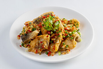Fried snapper with chili and salt isolated on white background