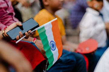  indian child holding, waving or running with Tricolour flag