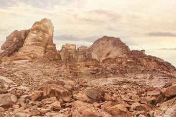 Fototapeta premium A beautiful day in the Jordanian desert of Wadi Rum. wide dessert with amazing mountains and sand dunes, amazing scenery that you should see. High quality photo