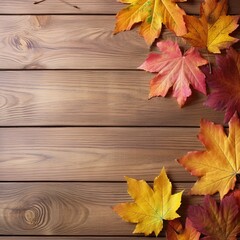 Naklejka na ściany i meble A collection of colorful autumn leaves on a wooden table with copy space. Happy Thanksgiving background concept.