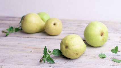 Pears on wooden table