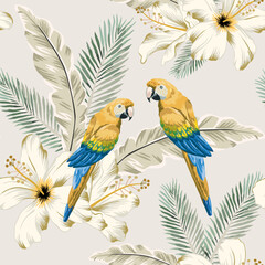 Yellow macaw parrots, hibiscus flowers, palm leaves, light background. Vector floral seamless pattern. Tropical illustration. Exotic plants, birds. Summer beach design. Paradise nature - 636990659
