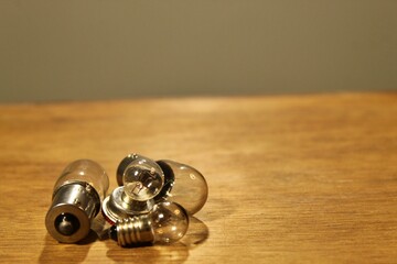 four lamps piled up on the table