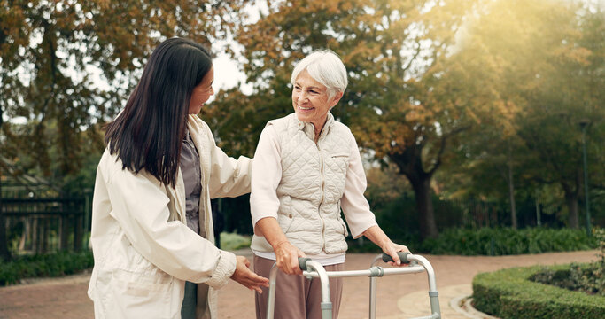 Park, walker and woman help senior walking as support, trust and care for morning healthcare exercise or workout. Health, physical therapy and elderly with caregiver for outdoor rehabilitation