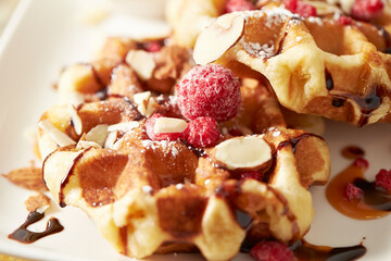 Waffles with nuts on a plate