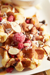 Waffles with nuts on a plate
