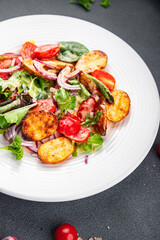 salad baked potato vegetable potato, tomato, onion, green salad leaves, salad dressing vinaigrette vegetables food healthy meal food snack on the table copy space food background rustic top view 