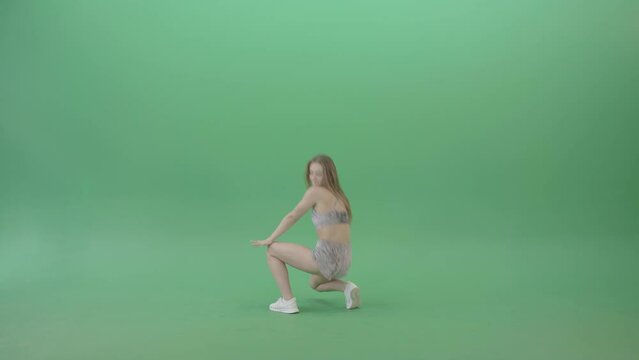 American girl in gray dress underwear shaking ass in twerk dance isolated on Green Screen 4K Video Footage.