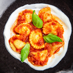 ravioli tomato sauce italian food meal snack on the table copy space food background rustic top view