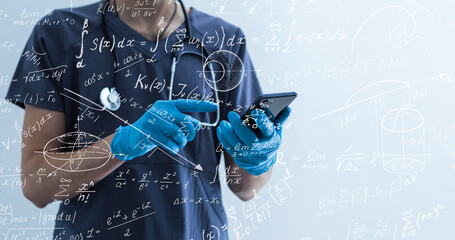 Quantitative analyst is drawing different math formulas on the glass screen.