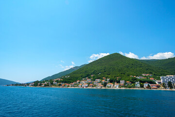seascape during a voyage on a yacht in the Bay of Kotor, Montenegro, bright sunny day, mountains and sea, travel