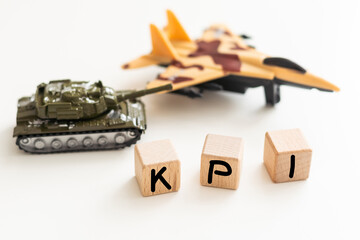 lined with kpi on yellow background. Military armored tank. war activities. Conflict between Russia and Ukraine. Flat lay Copy space Protest against military action. Peace on earth. Place for test