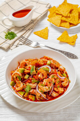 mexican shrimp cocktail salad in a bowl, top view