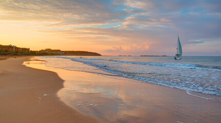 Fototapeta premium Colorful sea beach sunrise. Beautiful incekum beach scenery with calm waves and soft sandy beach. Empty tropical landscape - incekum, Alanya