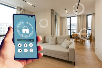 Internet of things, iot, smart home, kitchen and network connect concept. Human hand holding phone and smart home application to count power usage energy with blur kitchen background