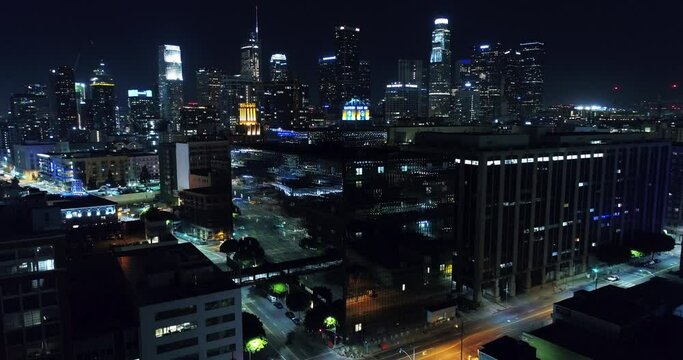 Aerial Lockdown Shot Of Illuminated Buildings In City At Night - Los Angeles, California