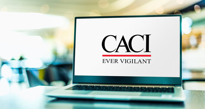 Laptop computer displaying logo of CACI International
