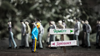 Street Sign to Humility versus Arrogance