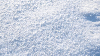 Fresh white snow texture top view. Perfection shining pure snowy background.